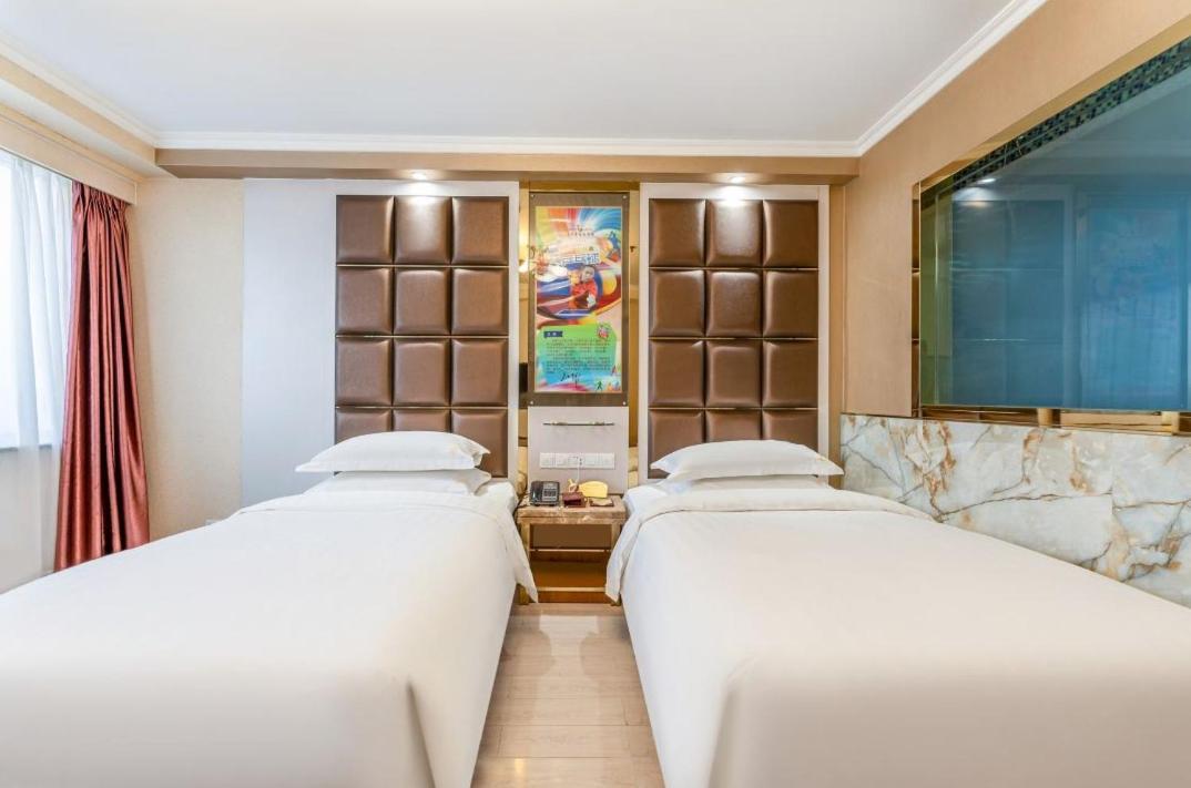 Jinan Yuquan Simpson Hotel Bagian luar foto