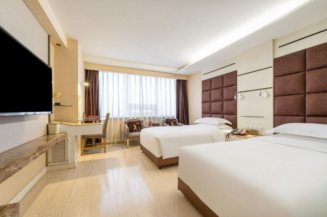 Jinan Yuquan Simpson Hotel Bagian luar foto
