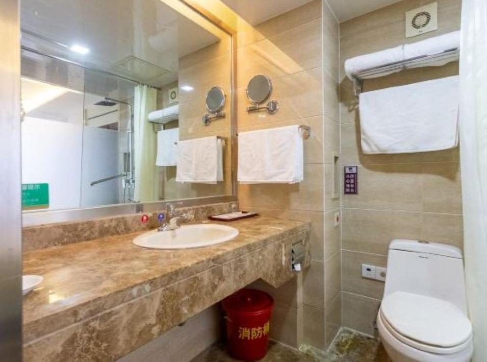 Jinan Yuquan Simpson Hotel Bagian luar foto